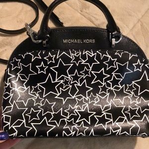 Micheal Kors Hans held or crossbody purse